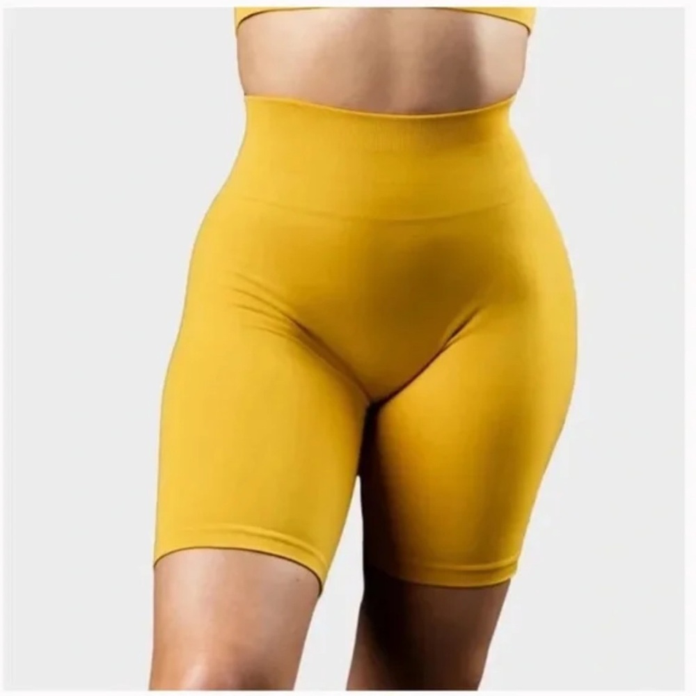 Alphalete Orange Bike Shorts High-Waisted Seamless Design